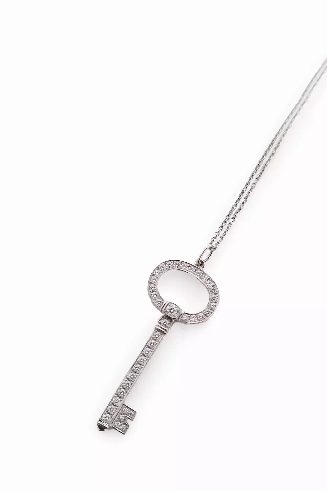 Tiffany & Co. Platinum Diamond Oval Key Pendant Necklace